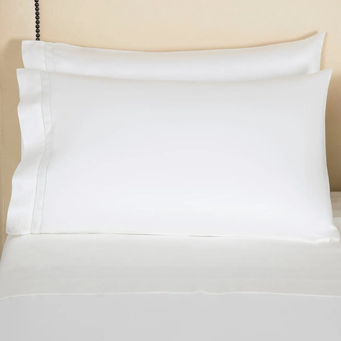 Doppio Ajour Milk Bedding by Frette