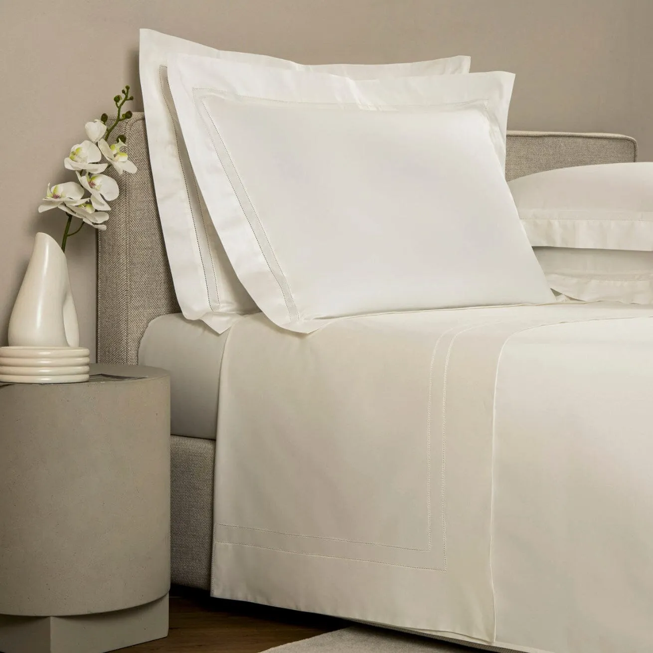 Doppio Ajour Milk Bedding by Frette