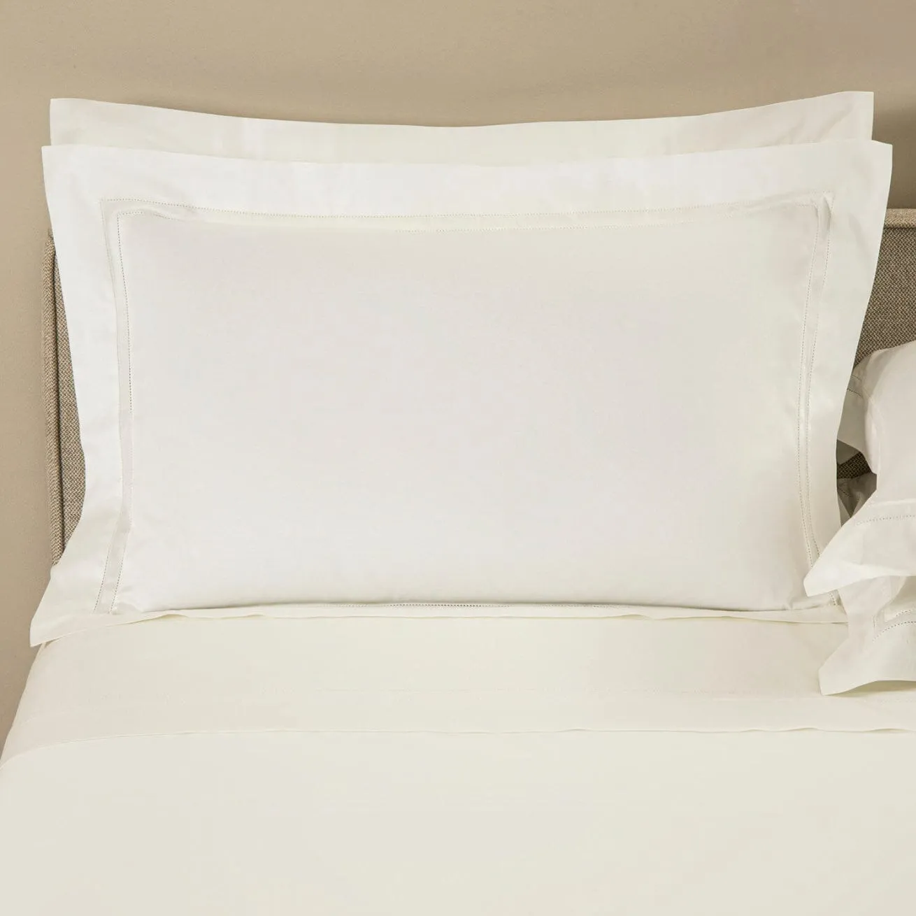 Doppio Ajour Milk Bedding by Frette