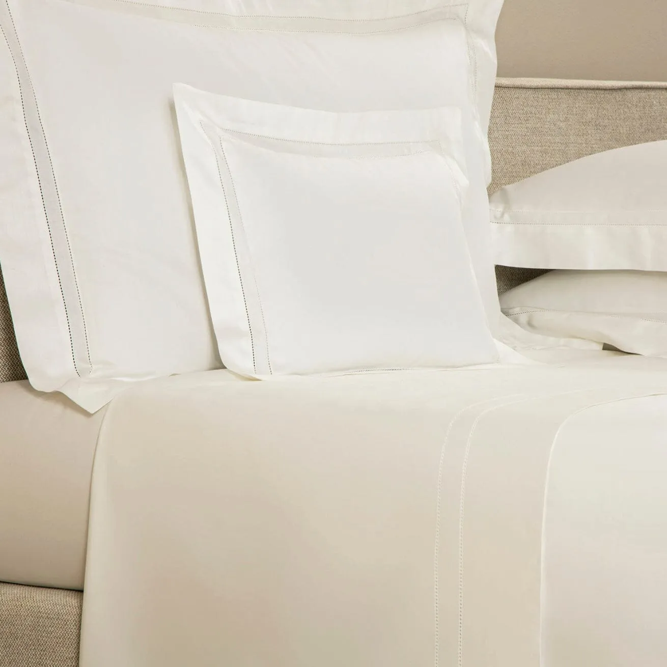 Doppio Ajour Milk Bedding by Frette