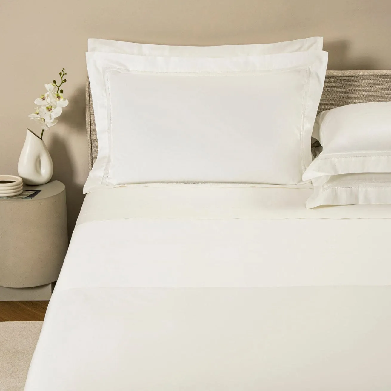 Doppio Ajour Milk Bedding by Frette