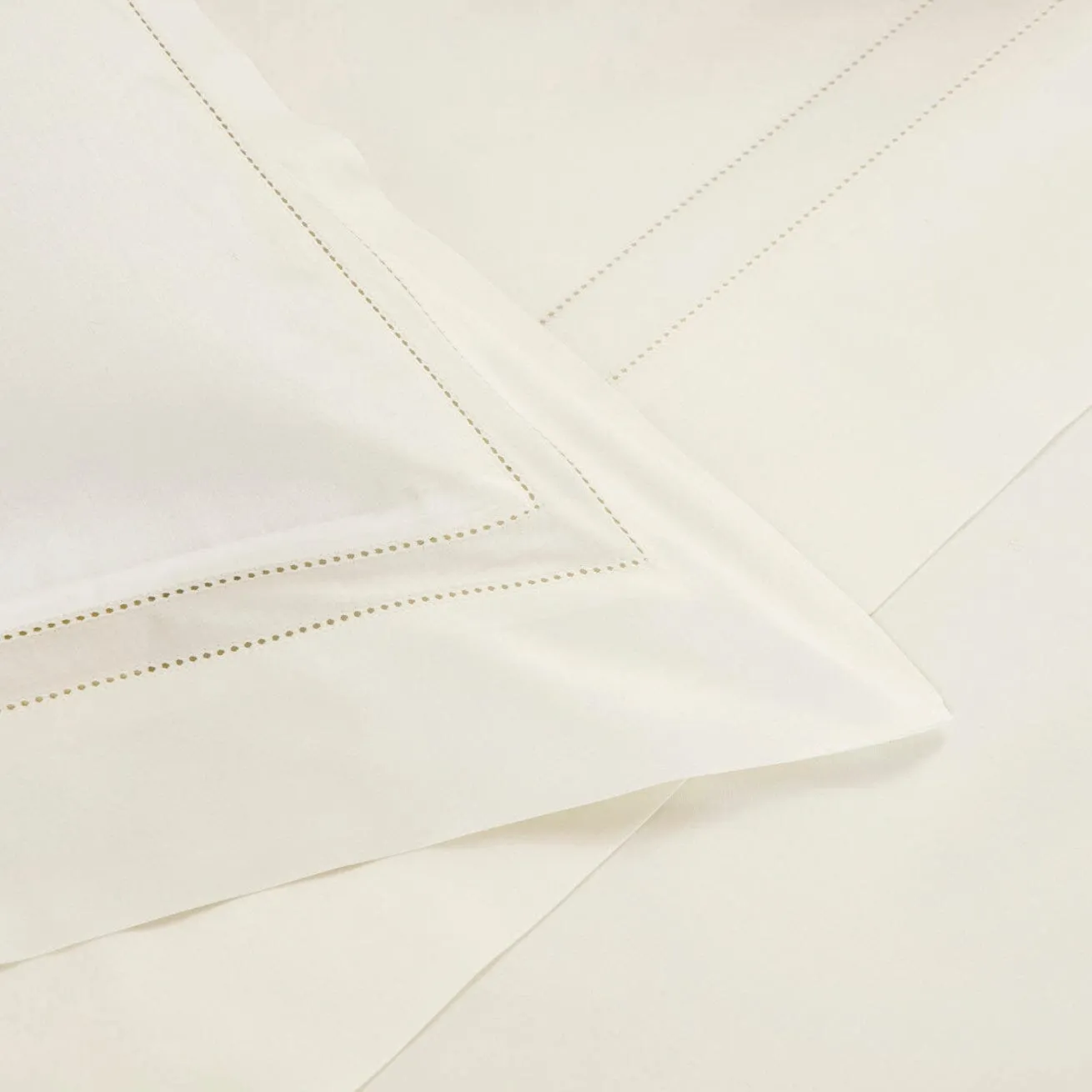 Doppio Ajour Milk Bedding by Frette